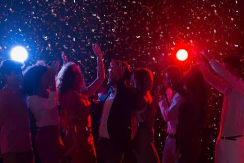 New Year's Eve Party. Happy Crowd Dancing At Nightclub, Copy Space